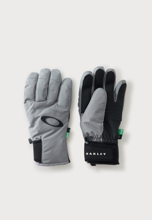 Pár sivých a čiernych zimných rukavíc Oakley s nastaviteľnými remienkami na zápästie a detailmi loga na bielom pozadí.