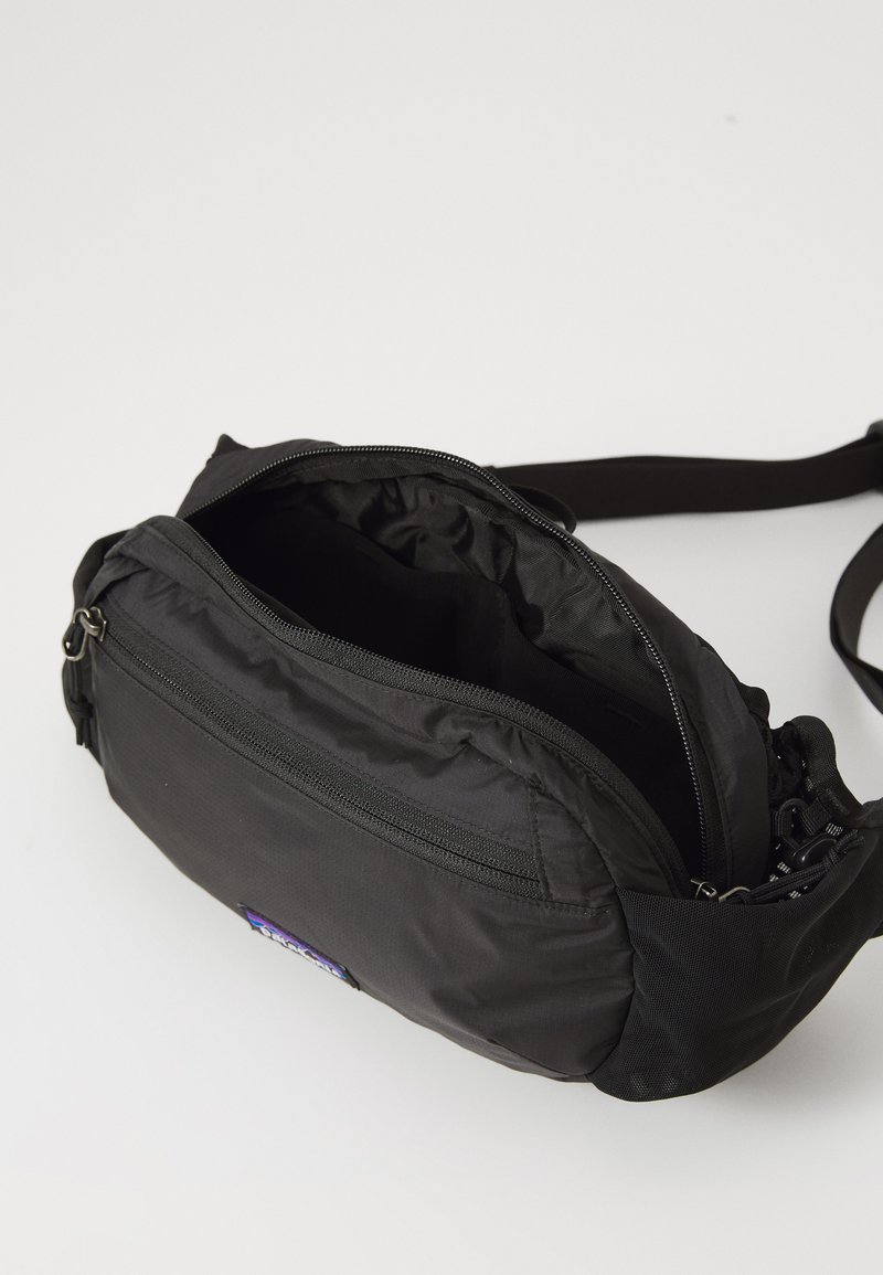 patagonia bum bag black Patagonia, Ultralight Hole Mini Hip Pack 1L, Bag, Black, All, Unisex Adult Sports & Outdoors Made in Vietnam Patagonia Black Hole Waist Pack