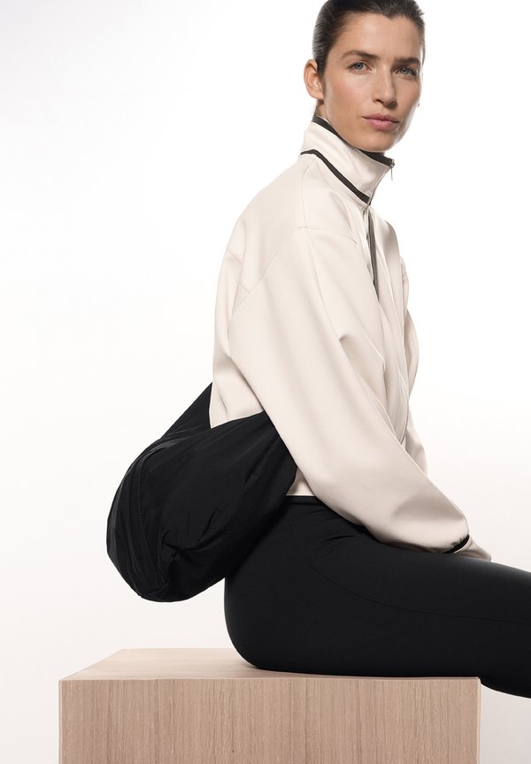 OVAL MESSENGER - Umhängetasche