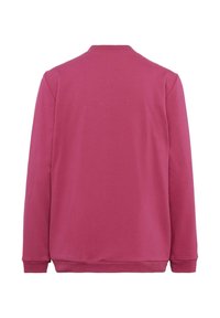 Sweatshirt fuchsia à manches longues, avec des poignets et un ourlet côtelés, et un col rond. Texture lisse et design simple, sans embellissements visibles.