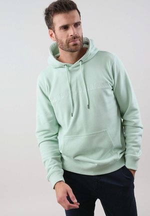 Mint green hoodie made from soft fabric, featuring a kangaroo pocket, drawstring hood, and embroidered text on the front.