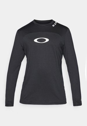 Black long-sleeve athletic shirt made of lightweight, textured fabric. Features a white logo on the chest and a contrasting collar design.