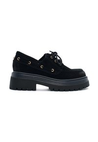 Scarpe platform in suede nero con occhielli dorati, punta tonda e suola in gomma spessa con battistrada testurizzato per una maggiore aderenza.