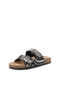 Infradito neri con due fasce larghe caratterizzate da dettagli intricati in perle e metallo, un plantare in sughero e una suola in gomma testurizzata.