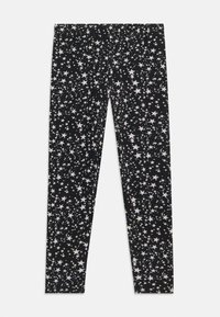 Leggings negros con un patrón de estrellas en tonos blancos y plateados. Fabricados con un material elástico y con una cintura elástica para mayor comodidad.