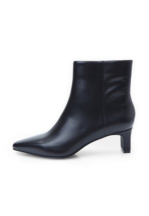 Black leather ankle boot with a pointed toe and a 2-inch block heel. Smooth texture with a clean silhouette and subtle stitching details.