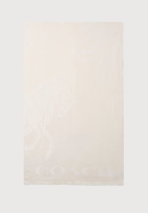 Krém színű takaró, diszkrét ló grafikával és a "COACH" felirattal, világos nyomattal. Puha, fringelt szélekkel készült.