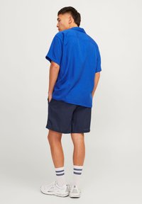 Jack & Jones JPSTJAIDEN JOGGER  - Donji dijelovi trenirke - navy blazer