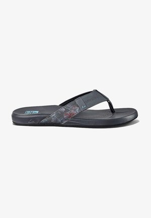 Dark gray flip-flop with a textured footbed, fabric strap featuring a colorful floral pattern, and a flexible rubber sole.