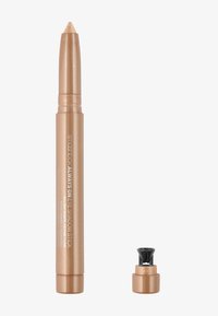 Guldmetallic øjenskygge-stift med spids tip, der har et sort dreje låg. Glat tekstur og cremet design for nem påføring.