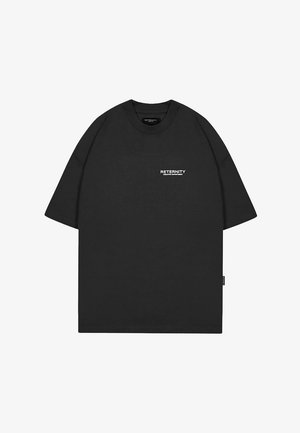 Schwarzes übergroßes T-Shirt aus Baumwolle mit kurzen Ärmeln und Rundhalsausschnitt. Auf der Vorderseite steht "RETENRITY" in weißer Schrift.