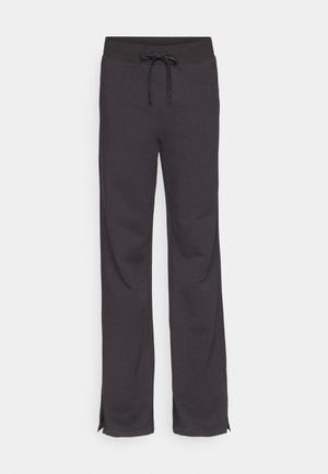 Pantalones deportivos negros con una cintura ajustable, piernas rectas y aberturas laterales en el dobladillo. Hechos de una tela suave y elástica.