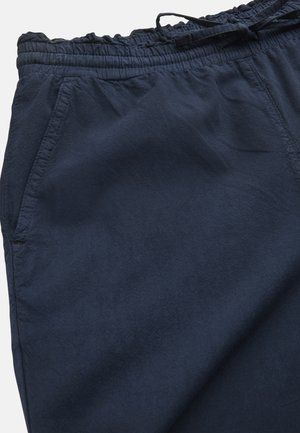 Navy blue casual pants with elastic waistband, drawstring tie, and side pockets, made of soft, lightweight fabric.