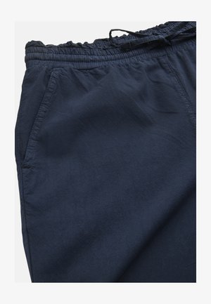 Marineblå afslappede bukser med elastisk talje, snøre og sidelommer, lavet af blødt, let stof.