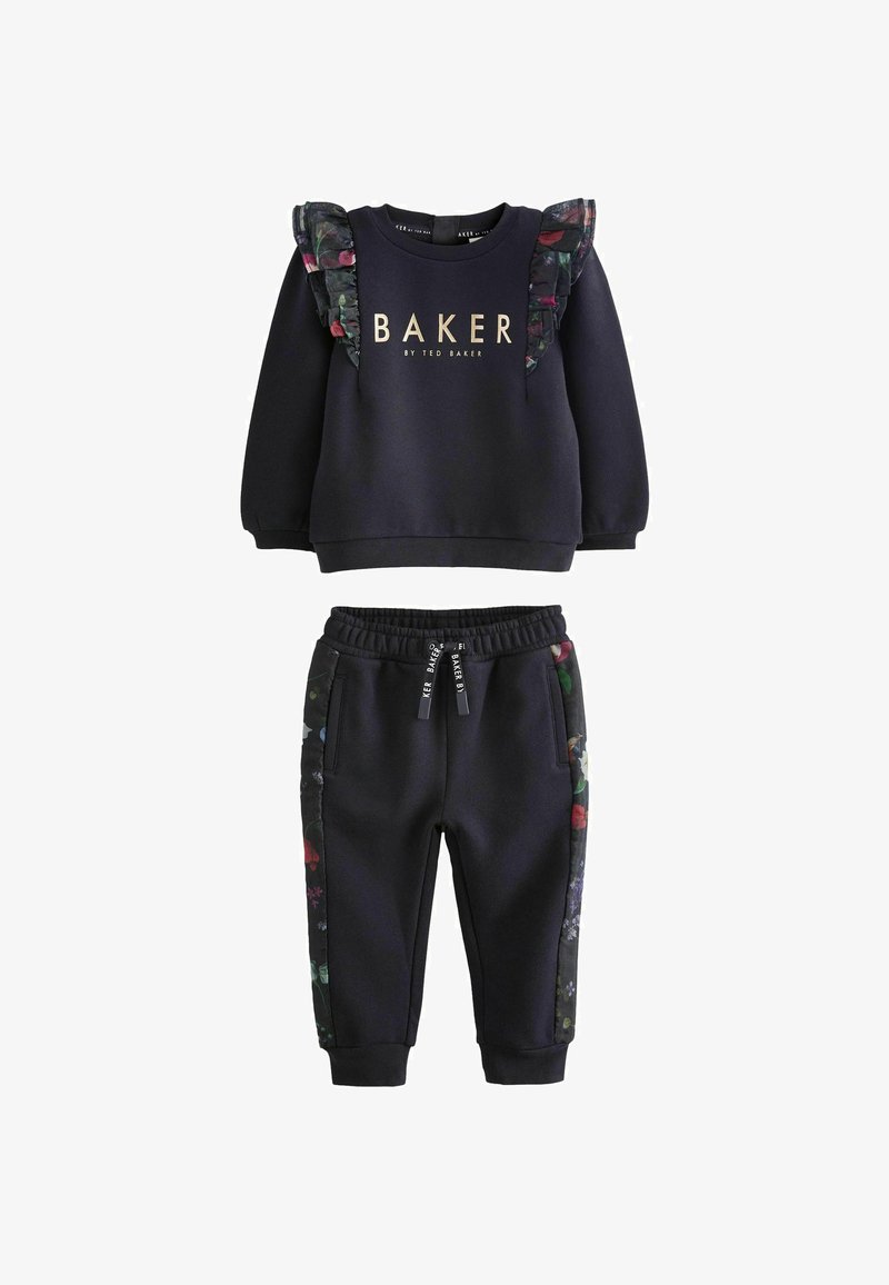 Dunkelblaues Trainingsset mit floralen Rüschenakzenten. Besteht aus einem Sweatshirt mit Rundhalsausschnitt und schmal zulaufenden Jogginghosen mit Seitentaschen und floralem Saum.