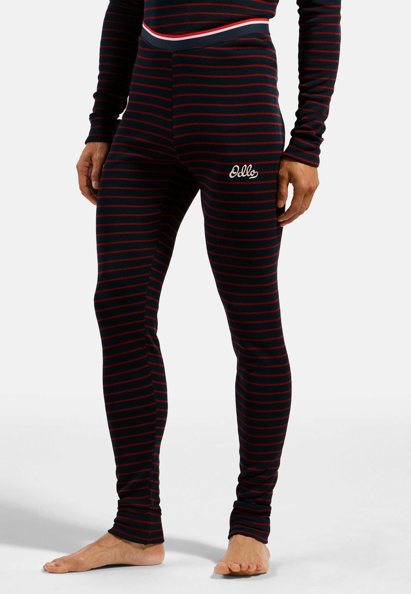 Schwarz-rot gestreifte Leggings mit einer engen Passform. Verfügt über einen elastischen Bund und ein kleines weißes besticktes Logo am Oberschenkel.