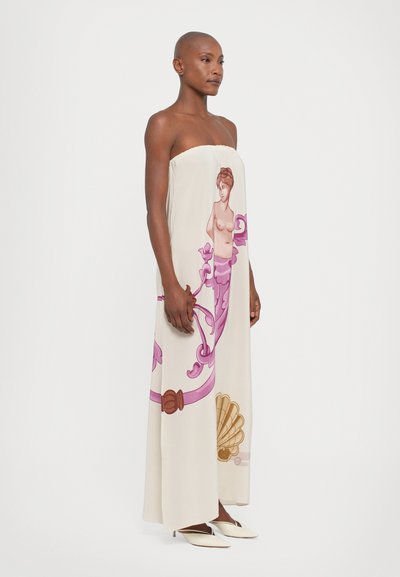 Strapless cream dress featuring a large pink graphic design with a female figure and ornamental details; flowy fabric, ankle-length silhouette.