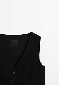 Gilet noir sans manches à col en V avec deux boutons et une étiquette portant la mention "Massimo Dutti" sur un fond blanc.