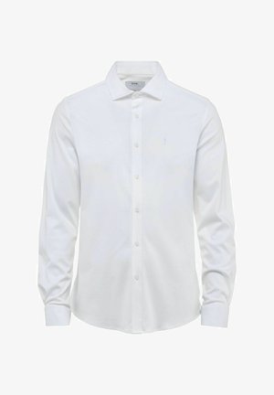 Biała koszula z długim rękawem, z kołnierzykiem i zapięciem na guziki z przodu. Gładki materiał, z subtelnym haftem na lewej piersi.