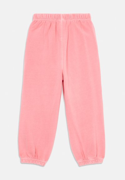 Sanfte rosa Fleece-Hosen mit elastischem Bund und gerafften elastischen Bündchen, lockere Passform, geeignet für Freizeit- oder Lounge-Bekleidung.