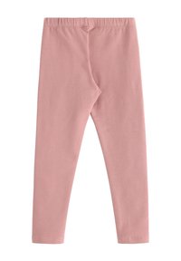 Pink cotton leggings with an elastic waistband, featuring a smooth texture and a fitted design. No prominent patterns or hardware details.
