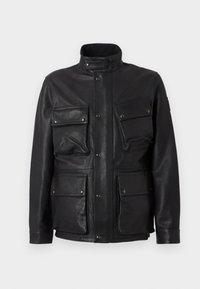 Black leather jacket with a high collar, multiple front pockets, and snap-button closures. Smooth texture and structured design.
