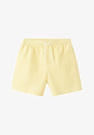 Shorts de bain rayés verticalement jaune et blanc avec taille élastique et cordon blanc, disposés à plat sur fond blanc.
