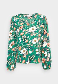 Blusa floral verde com mangas bufantes longas, decote em V, padrão de flores brancas e laranjas, e um tecido leve e fluido.