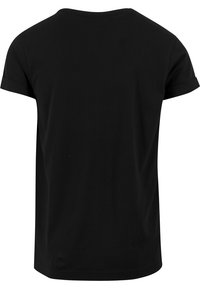 T-shirt noir uni à manches courtes vu de dos avec un col rond et des poignets de manches repliés.