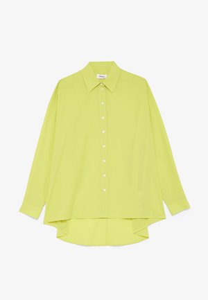 Camicia a maniche lunghe verde lime chiaro con colletto appuntito e orlo posteriore leggermente più lungo.