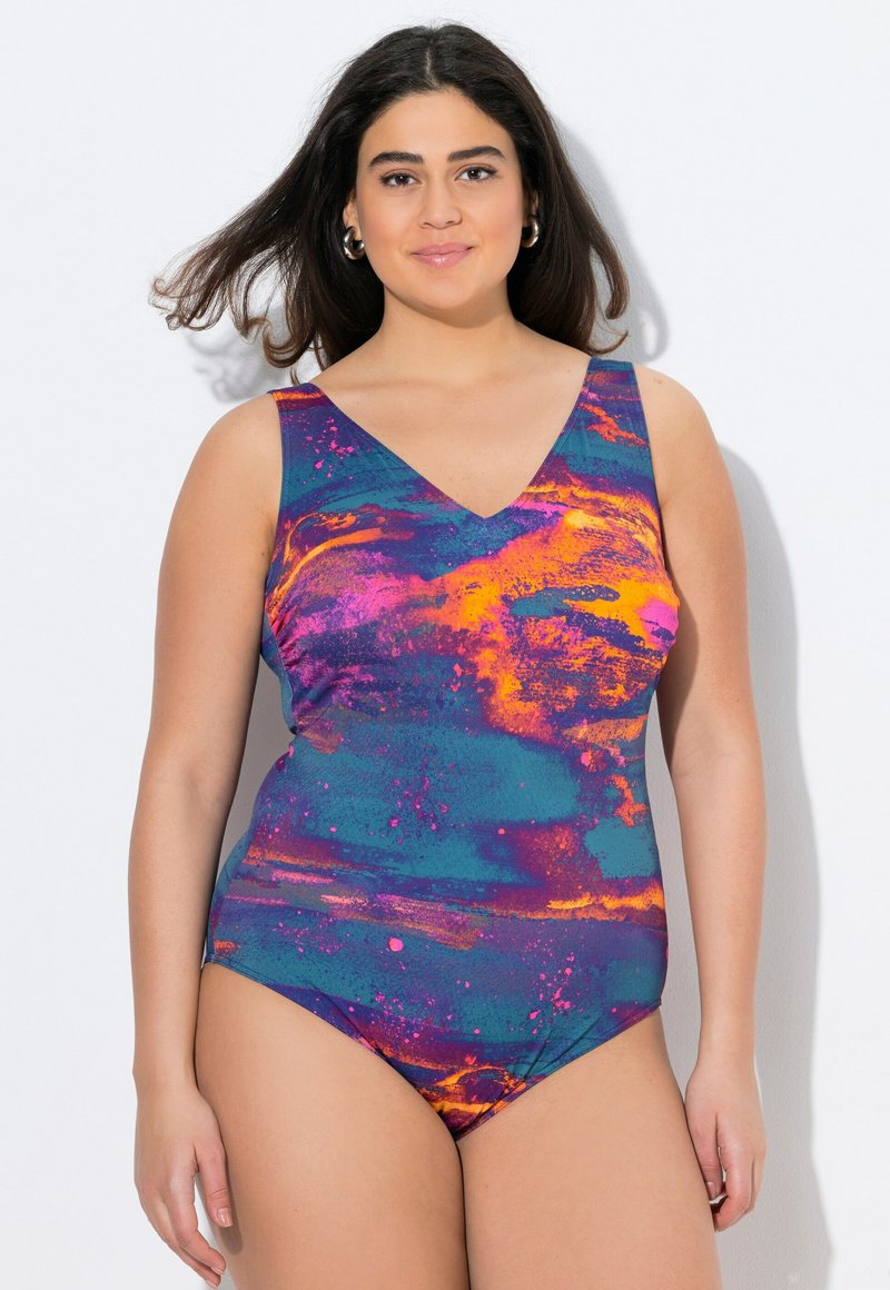 Maillot de bain une pièce éclatant avec un imprimé éclaboussé dans des couleurs bleue, rose, violette et orange. Il présente un décolleté en V et des bretelles larges.