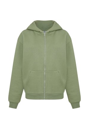 Grüne Kapuzenjacke mit Reißverschluss aus weichem Stoff, großem Kapuzen, frontalen Taschen und gerippten Bündchen. Gerade Saum und minimalistische Nahtdetails.