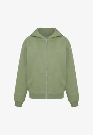Felpa verde con zip realizzata in tessuto morbido, dotata di un ampio cappuccio, tasche frontali e polsini a costine. Orlo dritto e dettagli di cucitura minimali.