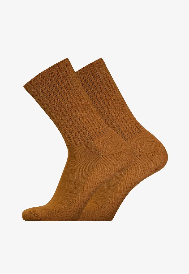 Brown ribbed socks with a smooth texture, featuring a reinforced heel and toe, showcasing a uniform color and medium height design.