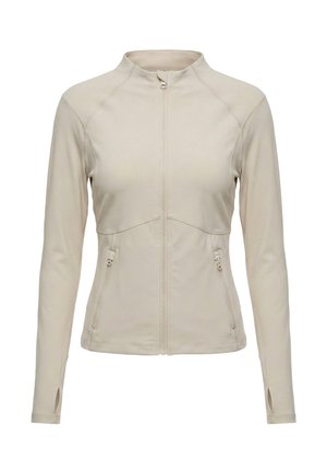 Beige Jacke mit langen Ärmeln, Frontreißverschluss, zwei seitlichen Reißverschlusstaschen, hohem Kragen und Daumenlöchern an den Ärmeln.
