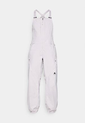 Vaaleanharmaat eristetyt haalarit, joissa on etuvetoketju, säädettävät X-malliset olkaimet, vetoketjulliset sivutaskut ja elastiset hihansuut. Varustettu logopainatuksella.