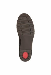 Semelle en caoutchouc marron avec un motif de bande de roulement texturé et un accent circulaire rouge, conçue pour le confort et la stabilité pendant le port.