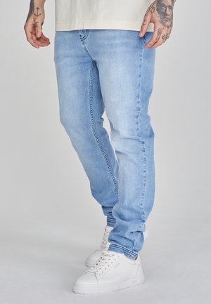 DROP CROTCH - Jeans Tapered Fit - light blue