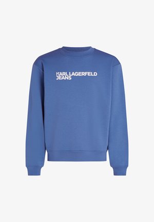 Mėlynas džemperis, pagamintas iš medvilnės mišinio, turi raštuotą apykaklę, ilgomis rankovėmis ir baltą "KARL LAGERFELD JEANS" logotipą priekyje.