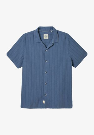 Chemise à manches courtes, boutonnée, en tissu texturé bleu foncé, avec un col camp et six boutons sur le devant. Motif de rayures verticales subtil.