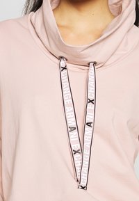 Armani Exchange Jersey con capucha - light pink