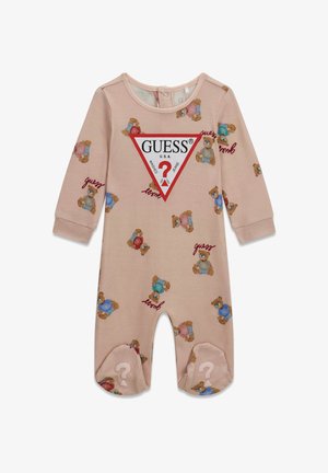 Body bébé à manches longues rose pâle avec motif ourson, triangle du logo Guess sur la poitrine et couvre-pieds avec des points d'interrogation.