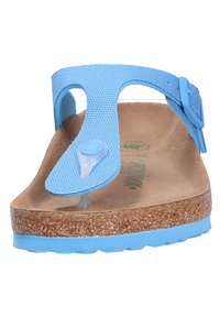 Light blue flip-flop sandal with a textured strap, cork footbed, and rubber sole. Features a central button detail and adjustable buckle.