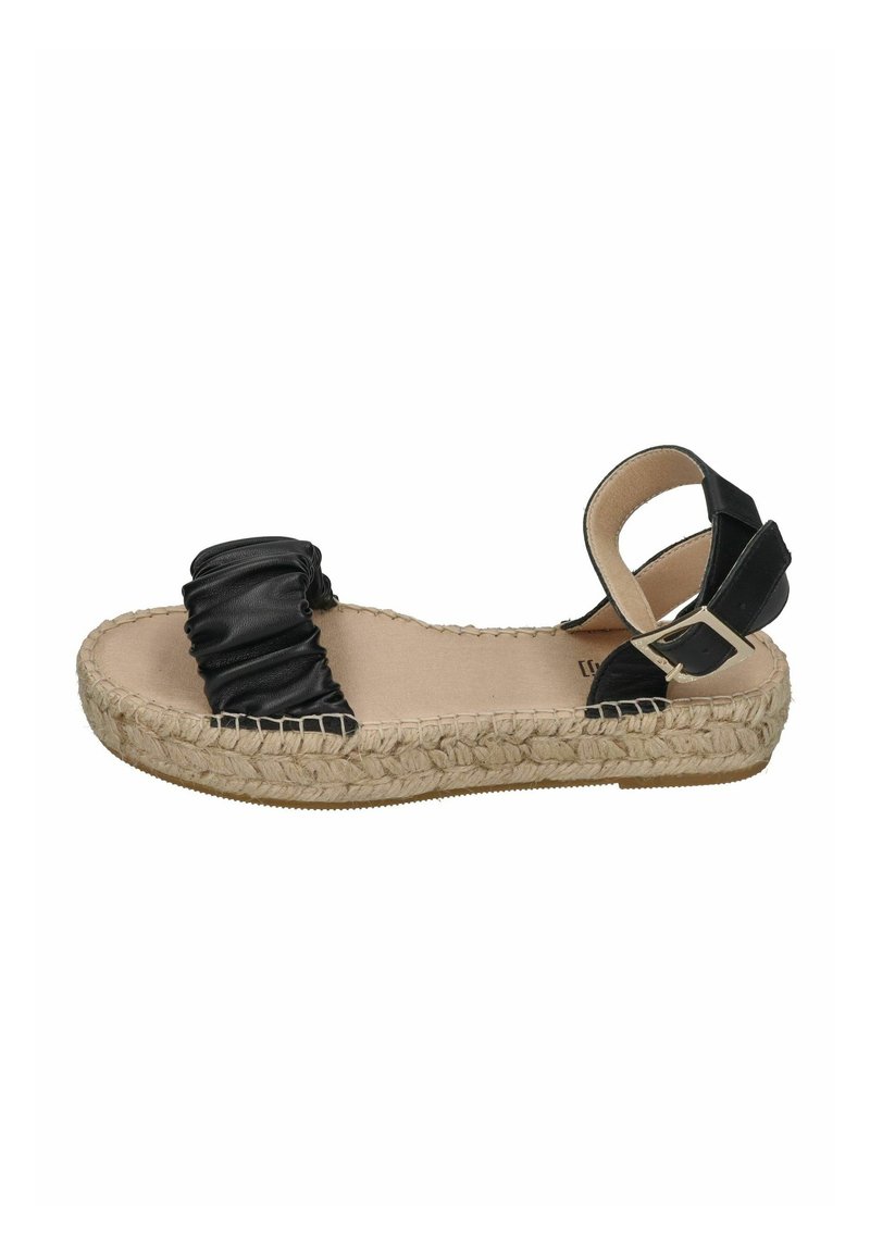 Black espadrille sandal with ruffled textile upper, wedge sole wrapped in jute, ankle strap with adjustable buckle, flat footbed.