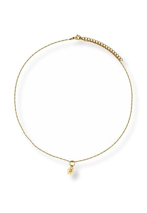 Delicate gold chain necklace with a small white daisy flower charm pendant and adjustable clasp on a white background.