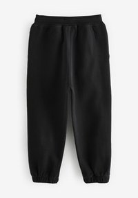 Čierne joggingové nohavice vyrobené z mäkkého materiálu, s elastickým pásom a zúženými nohavicami s elastickými manžetami. Bez vzorov alebo ozdôb.