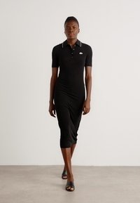 Lacoste Dzsörzéruha - black