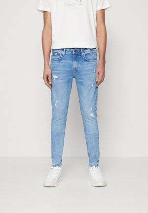 Jeans Tapered Fit - light-blue denim