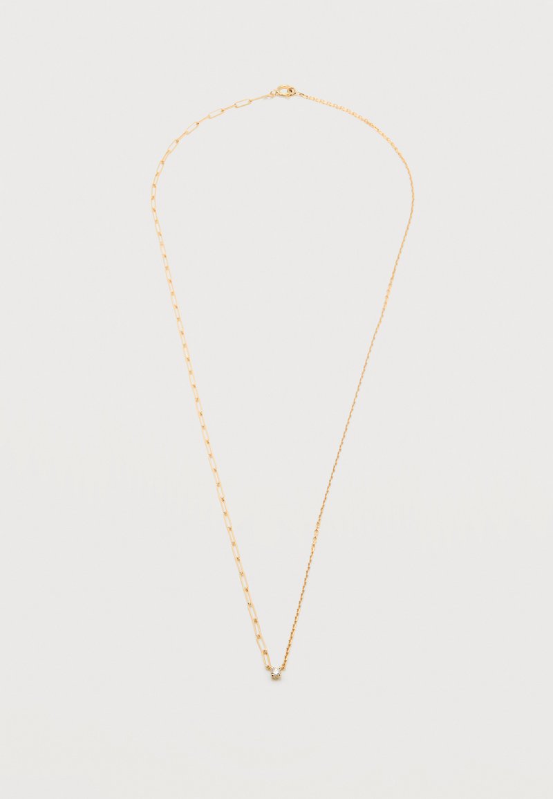 Κολιέ σε χρυσό τόνο που συνδυάζει σύνδεσμο αλυσίδας με λεπτή αλυσίδα, με μια μικρή διακοσμητική λεπτομέρεια στη μέση.