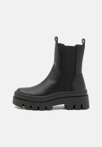 Bottines à plateau - black
